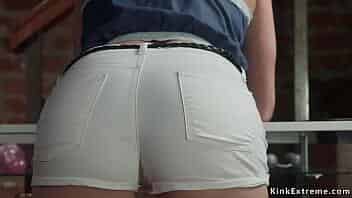 Sex shop owner Lea Lexis whips ass to lesbian customer Dahlia Sky in white tight shorts then with fat strap on dick anal fucks her from behind video